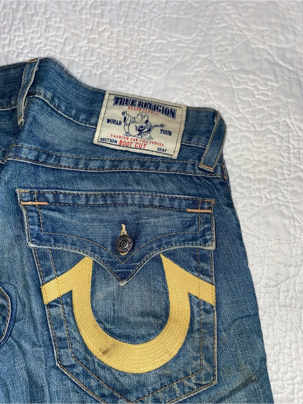 True Religion Men’s Bootcut Jeans in Blue Denim with Yellow Stitching